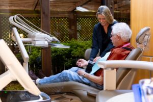 Modern dental treatment room with patient chair at Longmire Dental Conroe