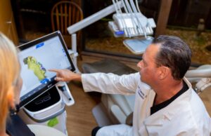 Dental exam at Longmire Dental office in Conroe TX before tooth extraction